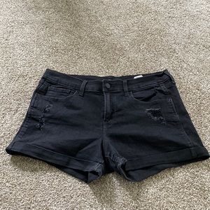 Black ripped shorts